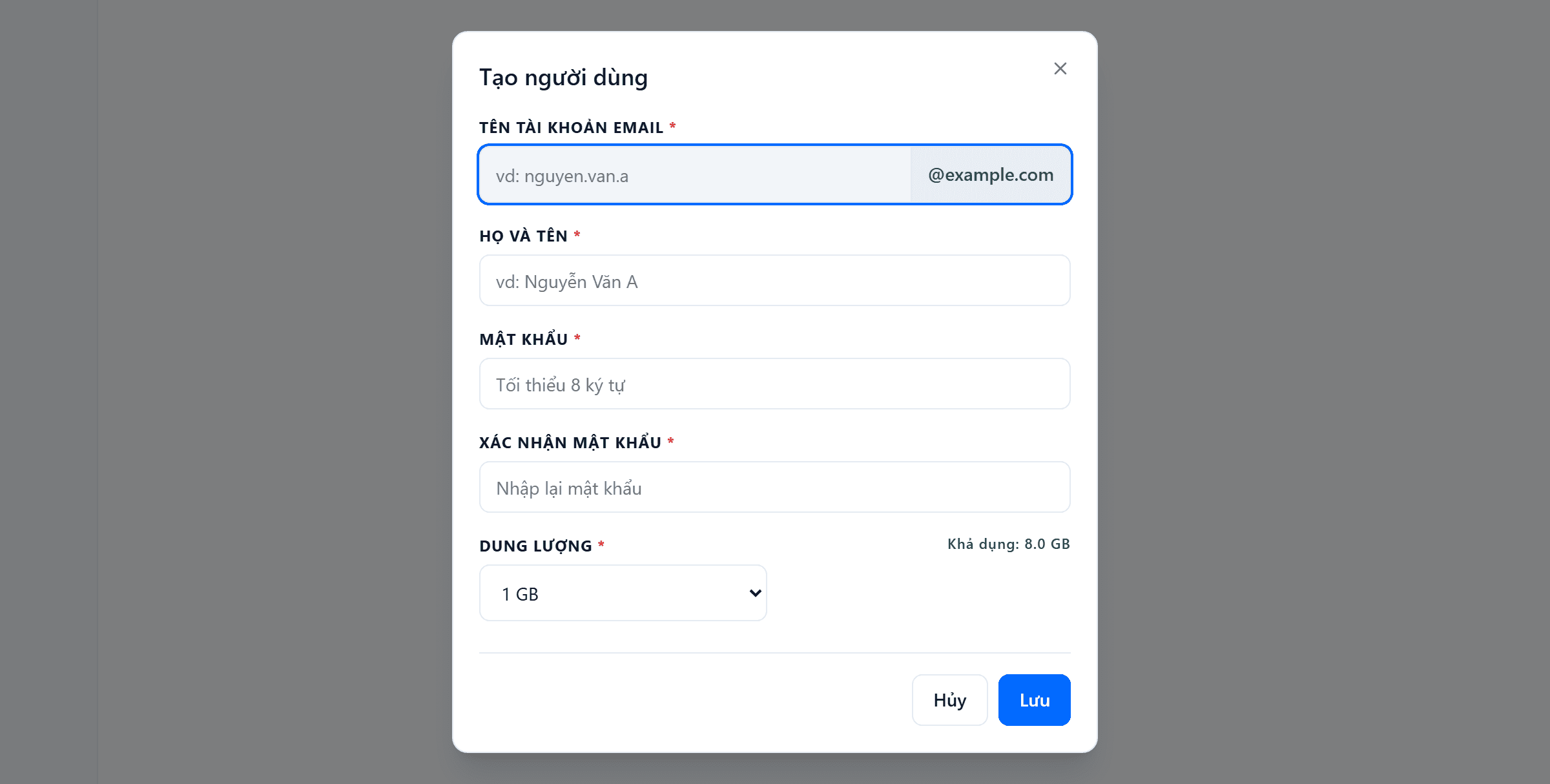 Hộp thoại Tạo người dùng: ô Tên tài khoản email có phần đuôi @example.com cố định bên phải, các ô Họ và tên, Mật khẩu tối thiểu 8 ký tự, Xác nhận mật khẩu, và ô Dung lượng dạng danh sách chọn kèm dòng chữ xanh Khả dụng 6.0 GB ở góc phải